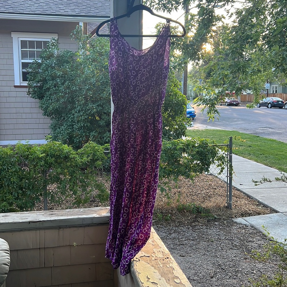 Full-length light summer dress.